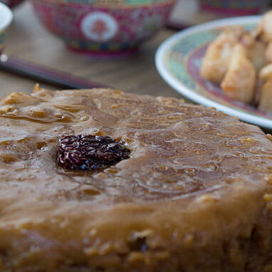 Traditional Chinese New Year’s cake.  It is a steamed cake prepared with glutinous rice flour, dates and brown sugar.